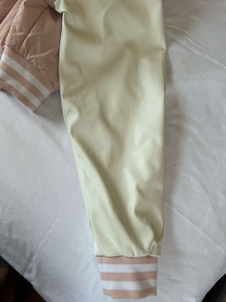 Vigoss Pink Jacket is both fashionable and practical for everyday wear.