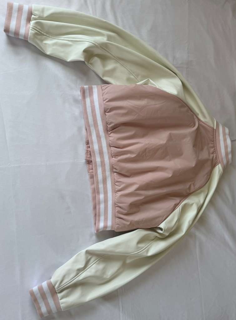 Vigoss Pink Jacket is both fashionable and practical for everyday wear.