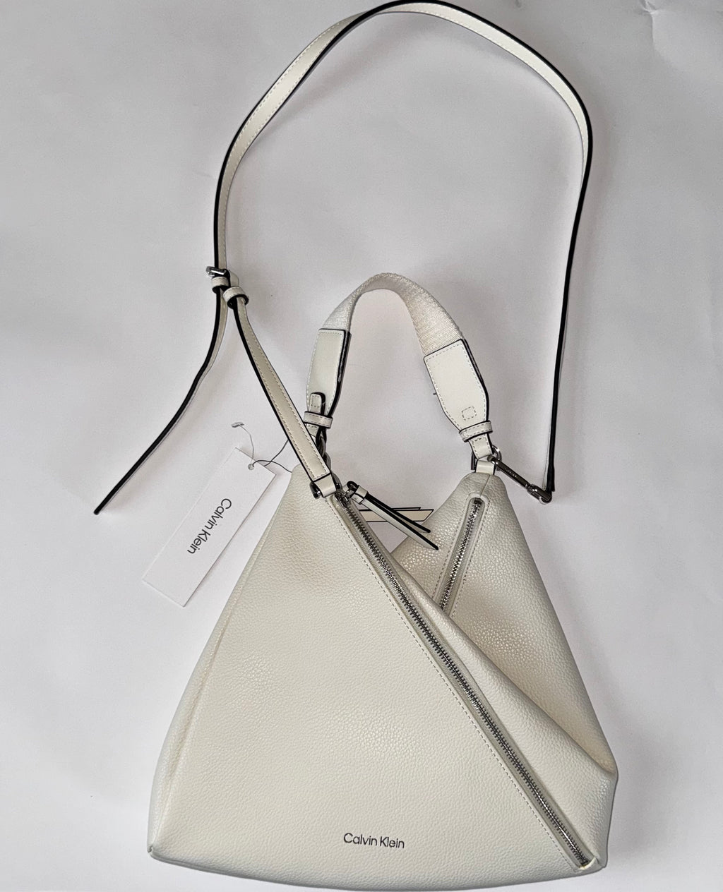 Calvin Klein Leather Geo Convertible Multi Zippered Hobo Bag White Silver Cross