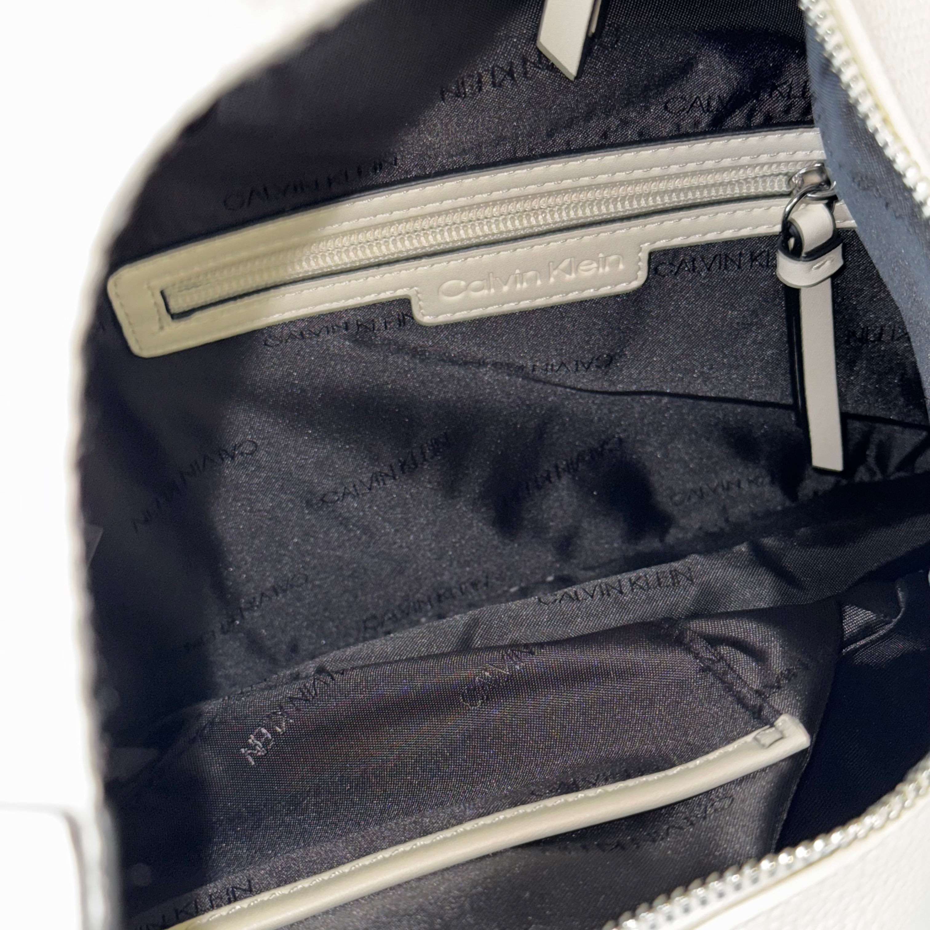 Calvin Klein Leather Geo Convertible Multi Zippered Hobo Bag White Silver Cross